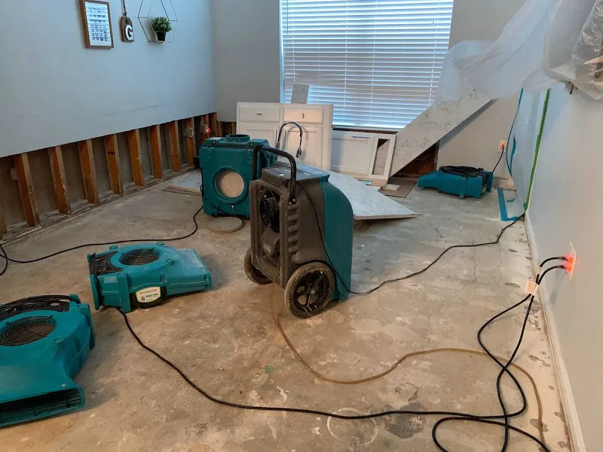 Dehumidifier in flood-cut room for Water Damage Restoration in Oak Hill